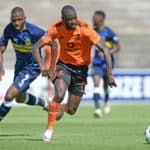 Deon Hotto of Orlando Pirates pulls away from Thamsanqa Mkhize of Cape Town City