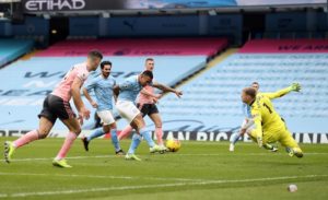 Read more about the article Man City narrowly beat Sheffield United to remain top