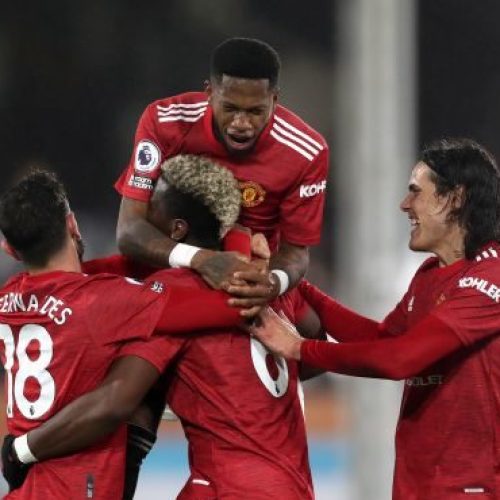 Pogba sends Manchester United back to top with stunning strike