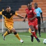 Mohamed Amadou Djibo of Horoya AC challenged by Samir Nurkovic of Kaizer Chiefs