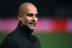Read more about the article Guardiola warns Man City the job is only half done against PSG