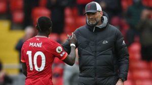 Read more about the article Mane double fires Liverpool to a third place finish