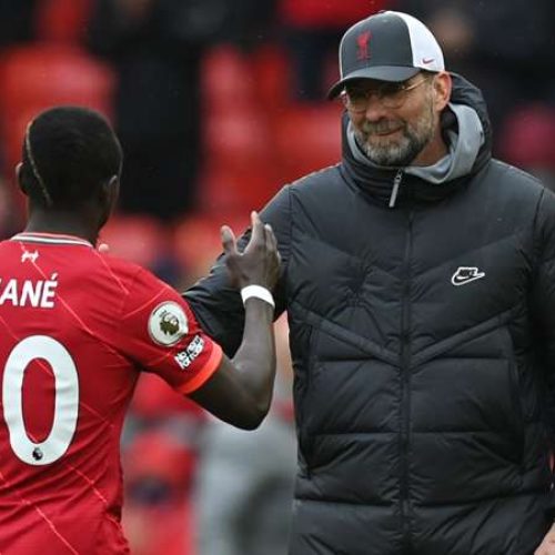 Mane double fires Liverpool to a third place finish