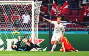 Read more about the article Denmark thump Wales to seal progression