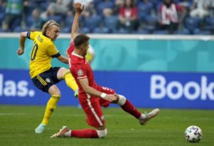 Read more about the article Sweden top Group E with last-gasp win over Poland