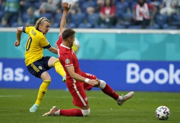 You are currently viewing Sweden top Group E with last-gasp win over Poland