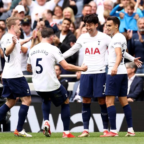 Spurs edge Watford to go top