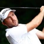 GREENSBORO, NORTH CAROLINA - AUGUST 14: Russell Henley of the United States plays his shot from the second tee during the third round of the Wyndham Championship at Sedgefield Country Club on August 14, 2021 in Greensboro, North Carolina. (Photo by Jared C. Tilton/Getty Images)