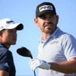 epa09351101 Louis Oosthuizen of South Africa (R) and Collin Morikawa of the U.S. (L) before teeing off on the ninth tee during the 3rd round of The Open 2021 golf championship at Royal St George's golf course in Sandwich, Kent, Britain, 17 July 2021. EPA/NEIL HALL