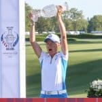 TOLEDO, OH - SEPTEMBER 06: Catriona Matthew, captain of Team Europe, hoists the Solheim Cup trophy over her head after accepting it from John Solheim, Chairman and CEO of PING, (not pictured) during the trophy presentation ceremony following the conclusion of the Singles Matches on Day 3 of the Solheim Cup on September 6, 2021 at the Inverness Clue in Toledo, Ohio. (Photo by Scott W. Grau/Icon Sportswire via Getty Images)