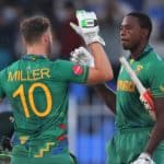 SHARJAH, UNITED ARAB EMIRATES - OCTOBER 30: David Miller and Kagiso Rabada of South Africa celebrate following the ICC Men's T20 World Cup match between South Africa and Sri Lanka at Sharjah Cricket Stadium on October 30, 2021 in Sharjah, United Arab Emirates. (Photo by Matthew Lewis-ICC/ICC via Getty Images)