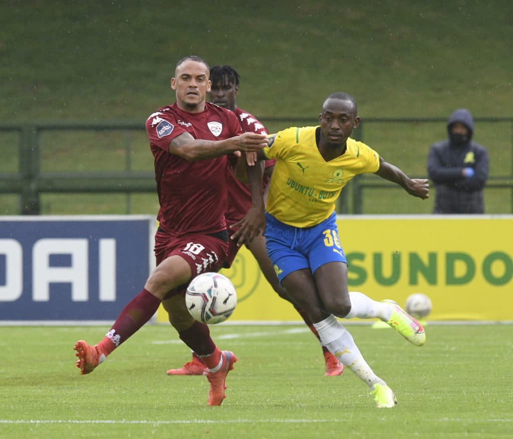 Peter Shalulile of Mamelodi Sundowns challenges Ryan De Jongh of Sekhukhune United FC
