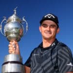 SUN CITY, SOUTH AFRICA - DECEMBER 06: Christiaan Bezuidenhout of South Africa poses with the trophy after his victory during the final round of the South African Open at Gary Player CC on December 6, 2020 in Sun City, South Africa. (Photo by Richard Heathcote/Getty Images)