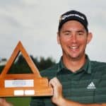 SOUTHAMPTON, BERMUDA - OCTOBER 31: Lucas Herbert of Australia poses with the trophy after winning the Butterfield Bermuda Championship at Port Royal Golf Course on October 31, 2021 in Southampton, Bermuda. (Photo by Cliff Hawkins/Getty Images)