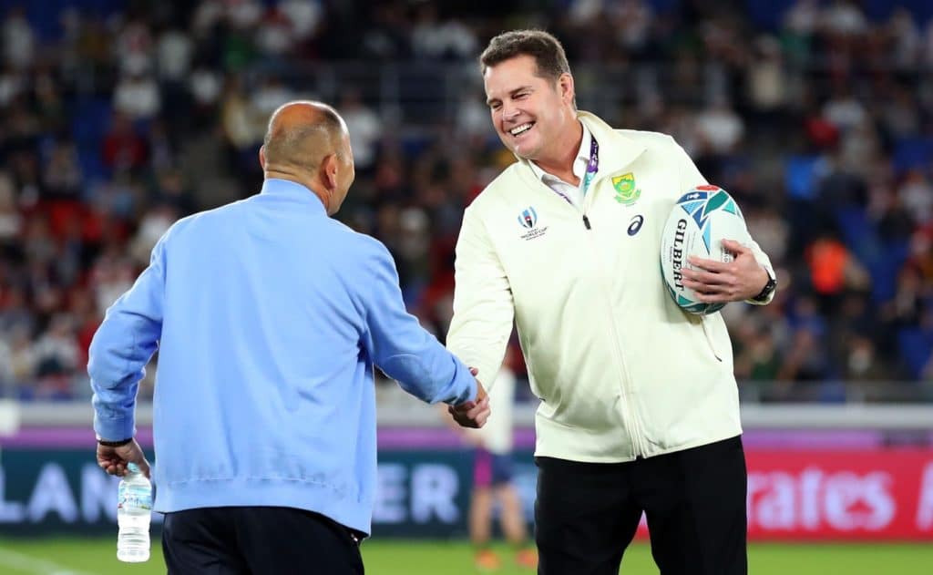 YOKOHAMA, JAPAN - NOVEMBER 02: Eddie Jones, Head Coach of England (L) shakes hands with Rassie Erasmus, Head Coach of South Africa prior to during the Rugby World Cup 2019 Final between England and South Africa at International Stadium Yokohama on November 02, 2019 in Yokohama, Kanagawa, Japan. (Photo by Cameron Spencer/Getty Images)