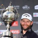 JOHANNESBURG, SOUTH AFRICA - JANUARY 12: Branden Grace of South Africa celebrates with the trophy after winning the tournament during Day Four of the South African Open at Randpark Golf Club on January 12, 2020 in Johannesburg, South Africa. (Photo by Warren Little/Getty Images)