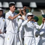 Marco Jansen of South Africa celebrates with teammates after getting the wicket of KL Rahul of India during day 2 of the third 2021 Betway Test Series game between South Africa and India at Newlands Cricket Ground in Cape Town on 12 January 2022 © Ryan Wilkisky/BackpagePix