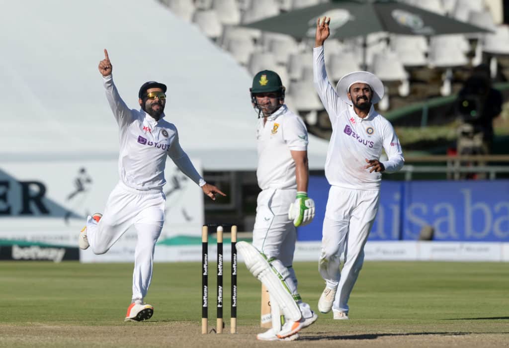Virat Kohli, captain of India runs to celebrate after Jasprit Bumrah gets the wicket of South Africa captain Dean Elgar during day 3 of the third 2021 Betway Test Series game between South Africa and India at Newlands Cricket Ground in Cape Town on 13 January 2022 © Ryan Wilkisky/BackpagePix