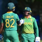 Janneman Malan of South Africa celebrates his 50 with teammate Quinton de Kock during the second 2022 Betway One Day Series game between South Africa and India at Boland in Paarl on 21 January 2022 ©Ryan Wilkisky/BackpagePix
