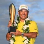 HONOLULU, HI - JANUARY 16: Hideki Matsuyama of Japan holds the trophy on the 18th green after the final round of the Sony Open in Hawaii at Waialae Country Club on January 16, 2022 in Honolulu, Hawaii. (Photo by Ben Jared/PGA TOUR via Getty Images)