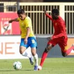 Erwin Saavedra Flores of Mamelodi Sundowns challenged by Bakhit Khamis Mohamed of Al Merrikh during their CAF Champions League clash