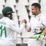 JOHANNESBURG, SOUTH AFRICA - JANUARY 06: Dean Elgar and Temba Bavuma of South Africa celebrate the teams victory during day 4 of the 2nd Betway WTC Test match between South Africa and India at Imperial Wanderers Stadium on January 06, 2022 in Johannesburg, South Africa. (Photo by Sydney Seshibedi/Gallo Images/Getty Images)