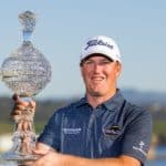 PEBBLE BEACH, CA - FEBRUARY 06: American PGA professional golfer Tom Hoge holds up the AT&T Pro-Am champions trophy after winning the PGA AT&T Pebble Beach Pro-Am on February 6, 2022 at Pebble Beach Golf Links in Pebble Beach, CA. (Photo by Bob Kupbens/Icon Sportswire via Getty Images)