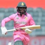 South Africa's captain Temba Bavuma runs between the wickets during the second one-day international (ODI) cricket match between South Africa and Pakistan at Wanderers Stadium in Johannesburg on April 4, 2021. - The South African team's kit and the wickets are pink to raise awareness for breast cancer. (Photo by Christiaan Kotze / AFP) (Photo by CHRISTIAAN KOTZE/AFP via Getty Images)