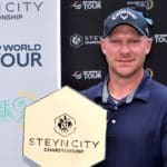 JOHANNESBURG, SOUTH AFRICA - MARCH 20: Shaun Norris of South Africa celebrates with the winners trophy after the final round of the Steyn City Championship at The Club at Steyn City on March 20, 2022 in Johannesburg, South Africa. (Photo by Warren Little/Getty Images)