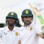 DURBAN, SOUTH AFRICA - APRIL 03: Dean Elgar of South Africa celebrates fifty runs with Keegan Petersen during day 4 of the 1st ICC WTC2 Betway Test match between South Africa and Bangladesh at Hollywoodbets Kingsmead Stadium on April 03, 2022 in Durban, South Africa. (Photo by Darren Stewart/Gallo Images/Getty Images)