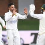 GQEBERHA, SOUTH AFRICA - APRIL 10: Keshav Maharaj and Kyle Verreynne of the Proteas celebrate the wicket of Najmul Hossain Shanto of Bangladesh during day 3 of the 2nd ICC WTC2 Betway Test match between South Africa and Bangladesh at St George's Park on April 10, 2022 in Gqeberha, South Africa. (Photo by Lee Warren/Gallo Images/Getty Images)