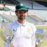South Africa's Keshav Maharaj poses with his trophies after receiving the player of the match and player of the series awards following the second Test cricket match between South Africa and Bangladesh at St George's Park in Gqeberha on April 11, 2022. (Photo by Marco LONGARI / AFP) (Photo by MARCO LONGARI/AFP via Getty Images)