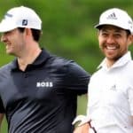 AVONDALE, LOUISIANA - APRIL 20: Patrick Cantlay and Xander Schauffele look on during a pro-am prior to the Zurich Classic of New Orleans at TPC Louisiana on April 20, 2022 in Avondale, Louisiana. (Photo by Chris Graythen/Getty Images)