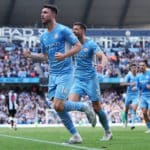 Man City reclaim top spot in style