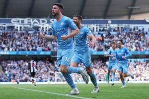 Read more about the article Man City reclaim top spot in style