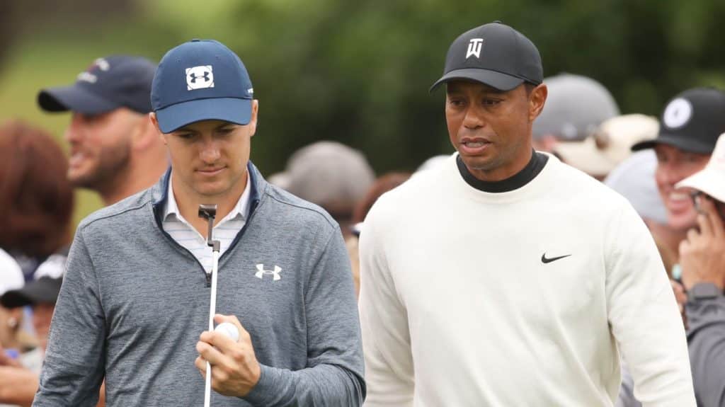 PEBBLE BEACH, CALIFORNIA - JUNE 12: Jordan Spieth of the United States (L) and Tiger Woods of the United States talk during a practice round prior to the 2019 U.S. Open at Pebble Beach Golf Links on June 12, 2019 in Pebble Beach, California. (Photo by Christian Petersen/Getty Images)