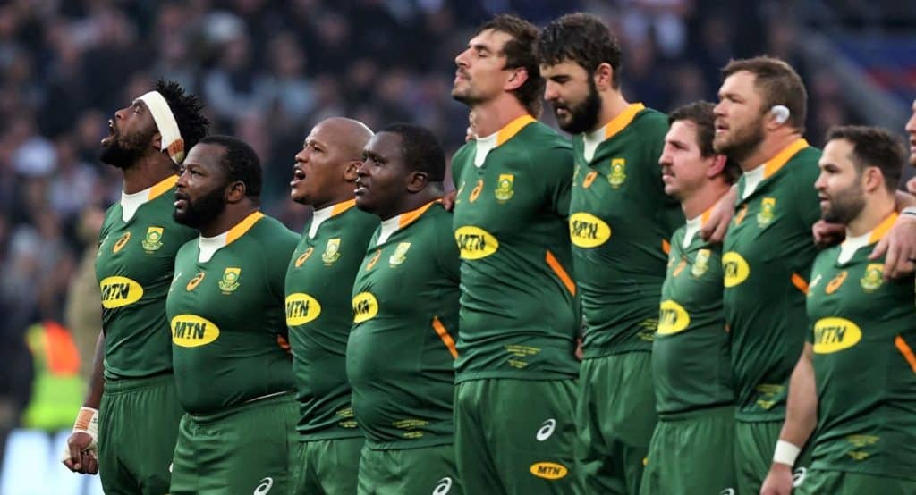 South Africa players sing the national anthem ahead of the Autumn International friendly rugby union match between England and South Africa at Twickenham Stadium, south-west London, on November 20, 2021. (Photo by Adrian DENNIS / AFP) (Photo by ADRIAN DENNIS/AFP via Getty Images)
