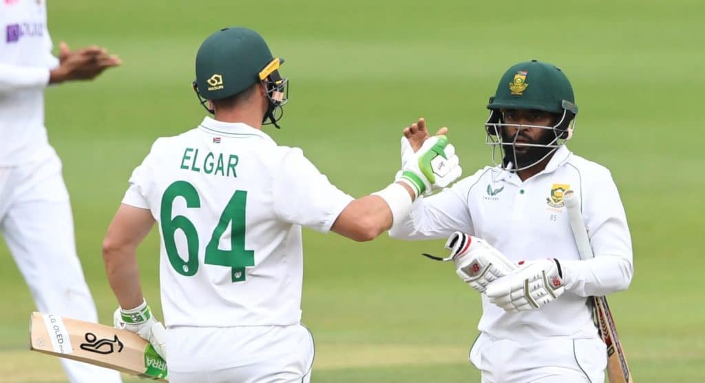 JOHANNESBURG, SOUTH AFRICA - JANUARY 06: Dean Elgar of the Proteas celebrates the win with Temba Bavuma of the Proteas during day 4 of the 2nd Betway WTC Test match between South Africa and India at Imperial Wanderers Stadium on January 06, 2022 in Johannesburg, South Africa. (Photo by Lee Warren/Gallo Images/Getty Images)