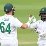JOHANNESBURG, SOUTH AFRICA - JANUARY 06: Dean Elgar of the Proteas celebrates the win with Temba Bavuma of the Proteas during day 4 of the 2nd Betway WTC Test match between South Africa and India at Imperial Wanderers Stadium on January 06, 2022 in Johannesburg, South Africa. (Photo by Lee Warren/Gallo Images/Getty Images)