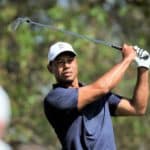 AUGUSTA, GEORGIA - APRIL 04: Tiger Woods of the United States takes a practice swing on the fourth tee during a practice round prior to the Masters at Augusta National Golf Club on April 04, 2022 in Augusta, Georgia. (Photo by Gregory Shamus/Getty Images)