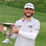 POTOMAC, MARYLAND - MAY 08: Max Homa of the United States celebrates with the trophy after winning during the final round of the Wells Fargo Championship at TPC Potomac at Avenel Farm on May 08, 2022 in Potomac, Maryland. (Photo by Gregory Shamus/Getty Images)