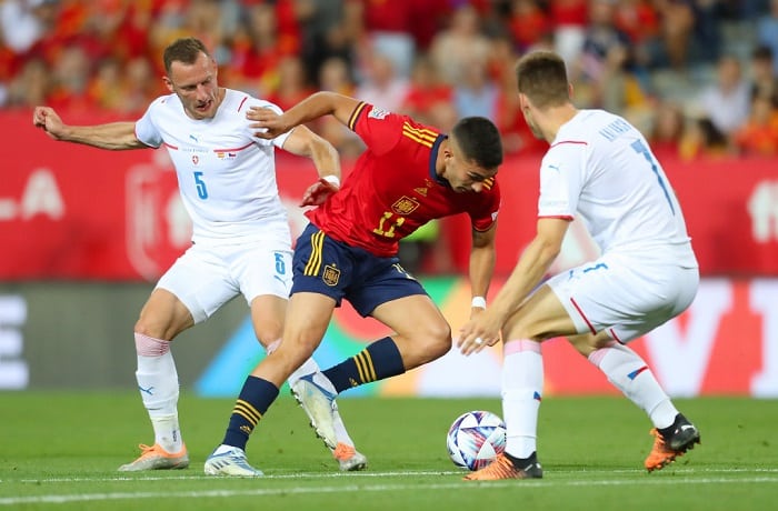 MALAGA, SPAIN - JUNE 12: Ferran Torres of Spain is challenged by Vladimir Coufal of Czech Republic during the UEFA Nations League League A Group 2 match between Spain and Czech Republic at La Rosaleda Stadium on June 12, 2022 in Malaga, Spain. (Photo by Fran Santiago/Getty Images)