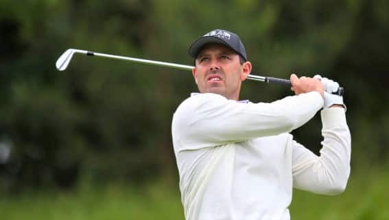 ST ALBANS, ENGLAND - JUNE 09: Charl Schwartzel of South Africa tees off on the 14th hole during day one of the LIV Golf Invitational at The Centurion Club on June 9, 2022 in St Albans, England. (Photo by Craig Mercer/MB Media/Getty Images)