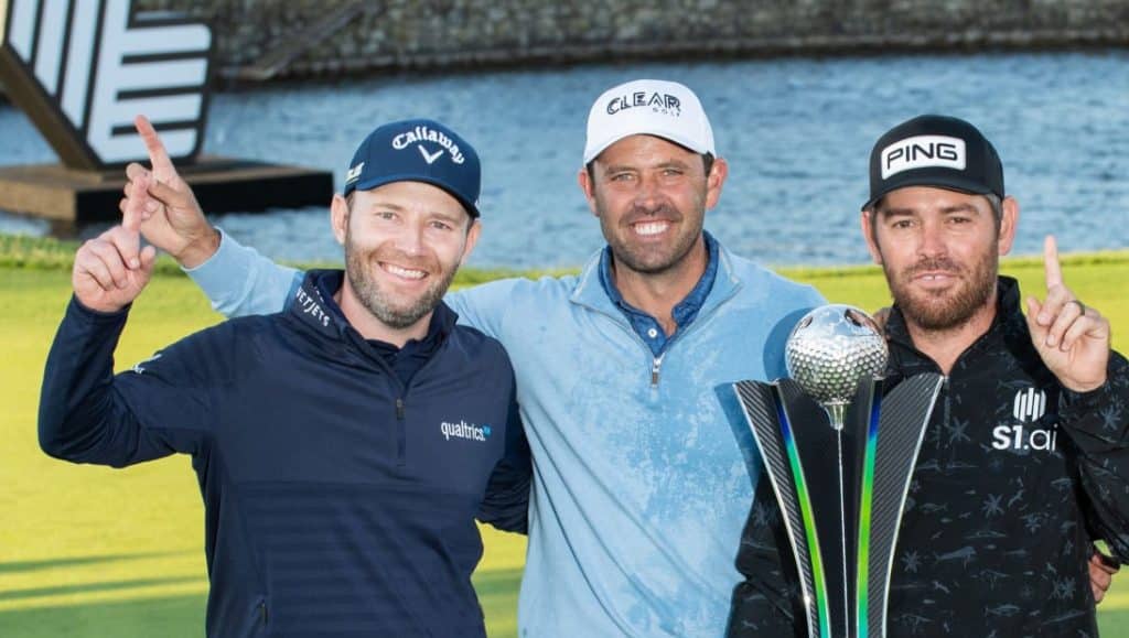 ST ALBANS, ENGLAND - JUNE 11: The Stinger GC team (L-R) Branden Grace of South Africa, Louis Oosthuizen of South Africa, Hennie du Plessis of South Africa and Charl Schwartzel of South Africa pose with the trophy during the final round of the Inaugural LIV Golf Invitational at The Centurion Club on June 11, 2022 in St Albans, England. (Photo by Montana Pritchard/LIV Golf/Getty Images)