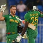 SHARJAH, UNITED ARAB EMIRATES - OCTOBER 30: David Miller and Kagiso Rabada of South Africa celebrate following the ICC Men's T20 World Cup match between South Africa and Sri Lanka at Sharjah Cricket Stadium on October 30, 2021 in Sharjah, United Arab Emirates. (Photo by Alex Davidson/Getty Images)