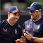 LONDON, ENGLAND - AUGUST 15: South Africa captain Dean Elgar speaks with coach Mark Boucher during a nets session at Lords Cricket Ground on August 15, 2022 in London, England. (Photo by Gareth Copley/Getty Images)