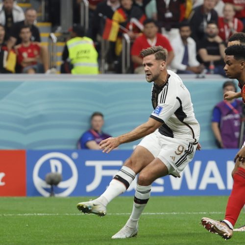 German comeback to hold Spain, Morocco stun Belgium