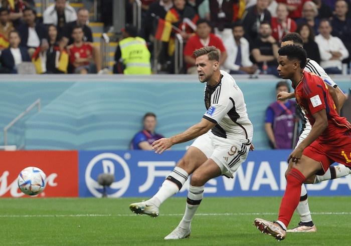 You are currently viewing German comeback to hold Spain, Morocco stun Belgium