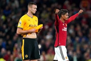 Read more about the article Varane seals Man Utd winner as VAR controversially denies Wolves penalty