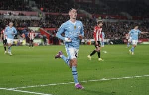 Read more about the article Man City close gap in title race after Foden hat-trick